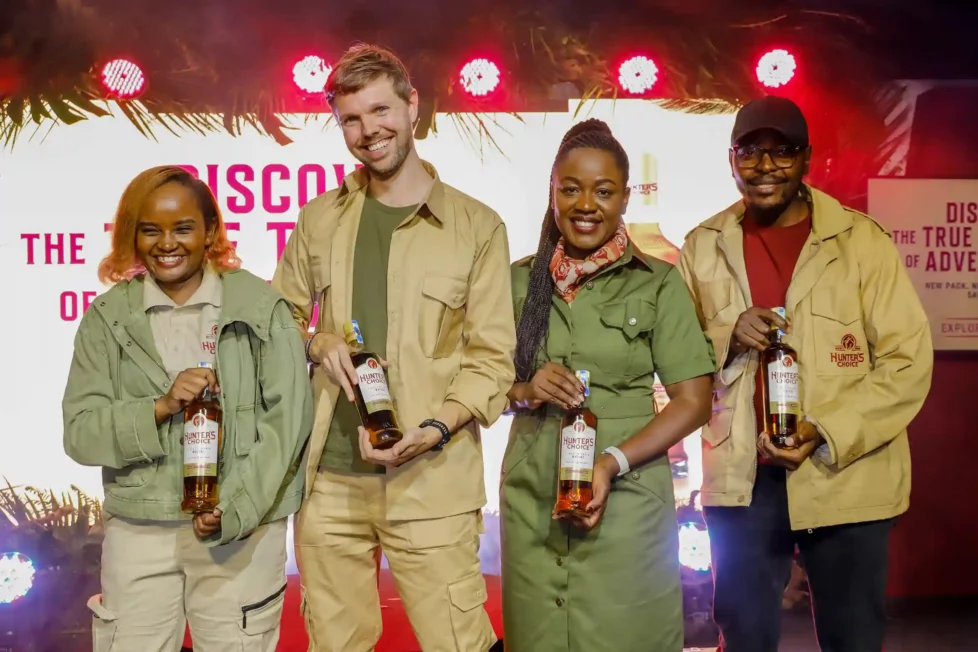 (From left to right) Lorraine Wairimu - Hunter’s Choice Brand Manager, Jonas Geeraerts, KWAL Commercial Director, Dr. Senorine Wasike - Head of Marketing KWAL and Dixy Adams – Hunter’s Choice Brand Executive pose for a photo with the newly branded bottle of Hunter’s choice during KWAL’s Hunter’s choice rebrand at the Kenya Wildlife Service Club House.