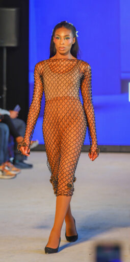 Sharon Wendo of Epica Jewellery displaying handcrafted African-inspired pieces at Africa Fashion Week London 2025.