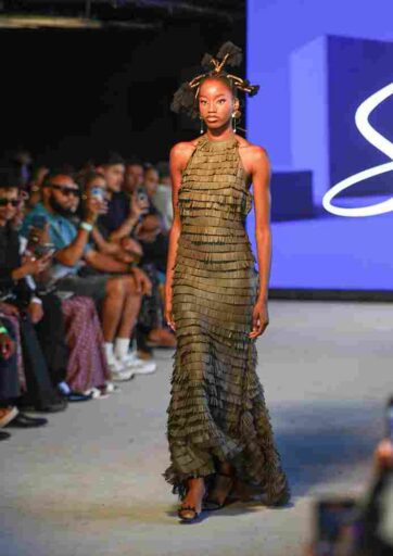 Jamie Bryan Kimani of Sevaria presenting gender-fluid designs inspired by Maasai and Akorino heritage at Africa Fashion Week London 2025.