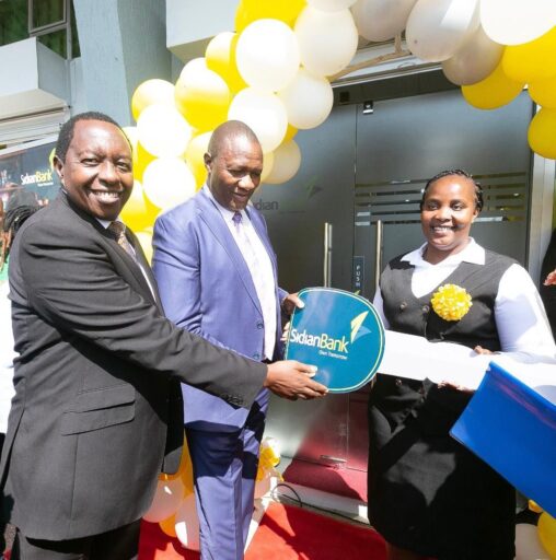 From left , Sidian Bank CEO Mr Chege Thumbi, Nyandarua governor Dr. Moses Kiarie Badilisha and Sidian Bank Ol Kalou Branch Manager Monica Kamau during the Bank’s opening in Ol Kalou Nyandarua County.