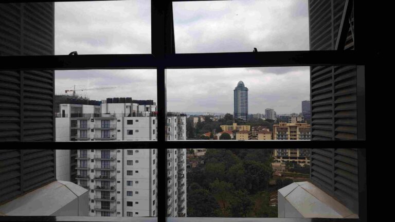 Kenyan residential housing estate with modern townhouses and lush landscaping