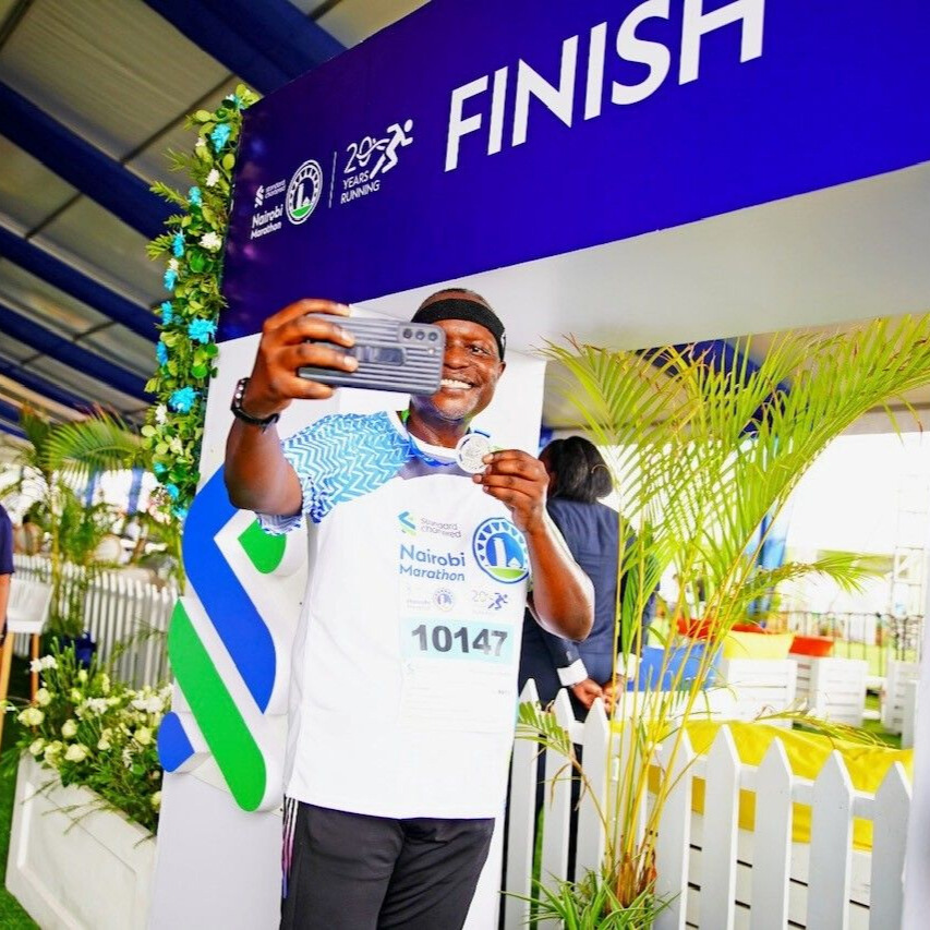 Kariuki Ngari, CEO and Managing Director of Standard Chartered Bank Kenya, speaking at a podium during a banking conference.