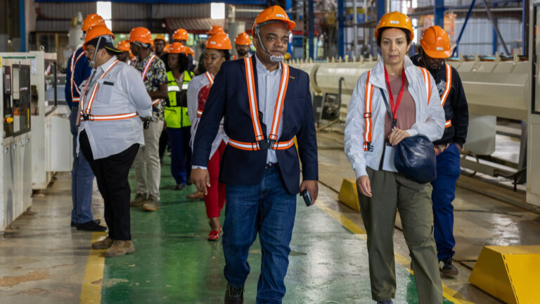 Equity BCDC Associate Director Paty Paterne Mushagalusa and Equity Group Director Nicole Dow lead international delegates on a tour of MES Holdings in Lubumbashi during the DRC trade mission.