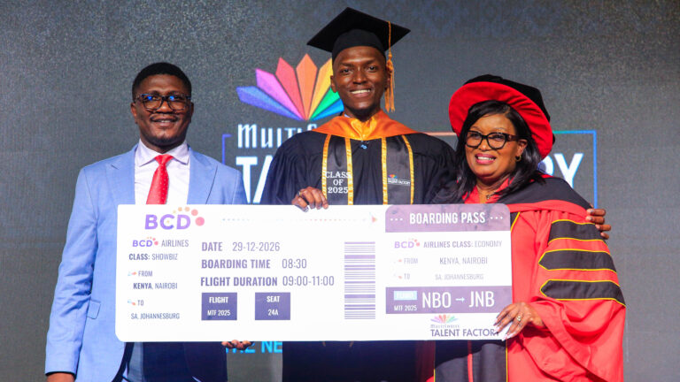 PS Fikirini Jacobs and Victoria Goro presenting the Overall Best Student award to Kelvin Dennis at MTF Graduation.