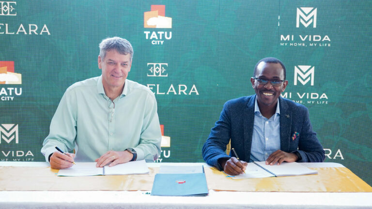 Stephen Jennings, Founder and CEO of Rendeavour, and Samuel Kariuki, Chief Executive Officer of Mi Vida Homes, sign a service agreement at the official launch of 156 Elara luxury townhouses in Tatu City, Kenya.
