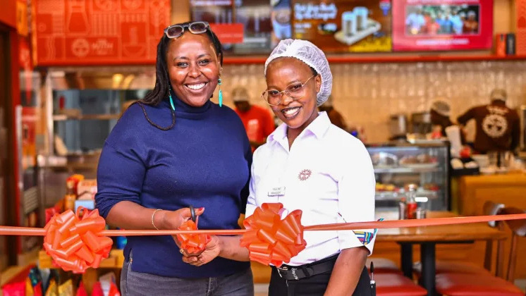 Java House CEO Priscillah Gathungu and Thindigua Branch Manager Pauline Omware at the opening of the chain's 110th branch in Kiambu County.