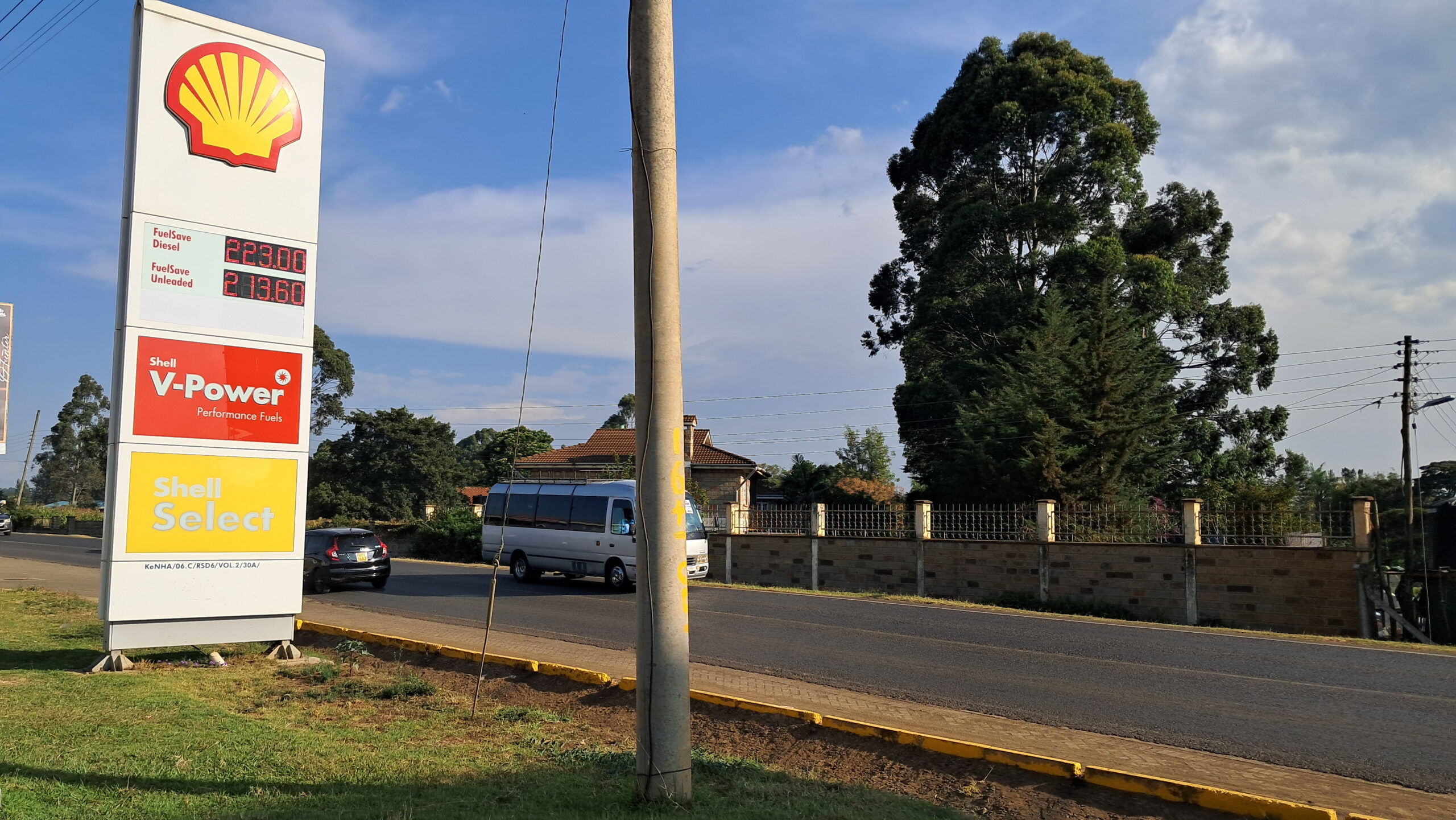 Shell service station price board showing diesel at Ksh223.00 and unleaded petrol at Ksh213.60 per litre in Kenya