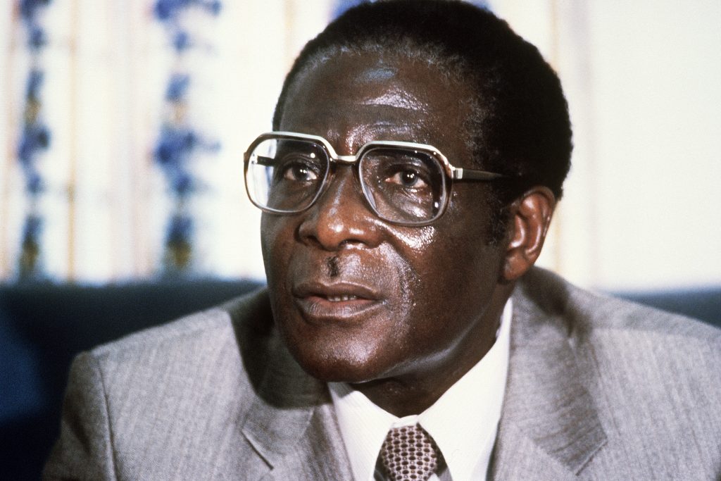 Robert Mugabe threatens to punch reporter that asked him 