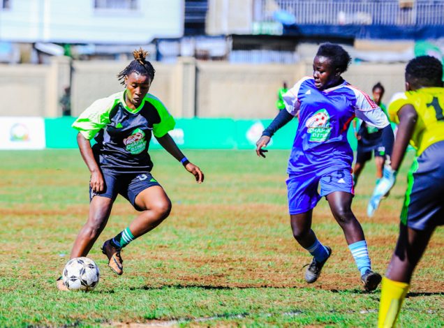 Kanana Queen (L) of Carolina for Kibera controls the ball from Ceolia Yvone (R) of Acacoro Blues during the Safaricom Chapa Dimba Nairobi region finals held at Goan Institute, Acacoro Blues won through Penalty kicks.