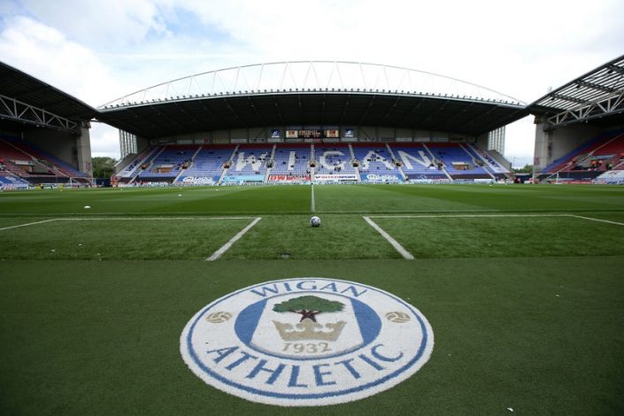 Wigan and Sheffield Wednesday to avoid relegation from the Championship.