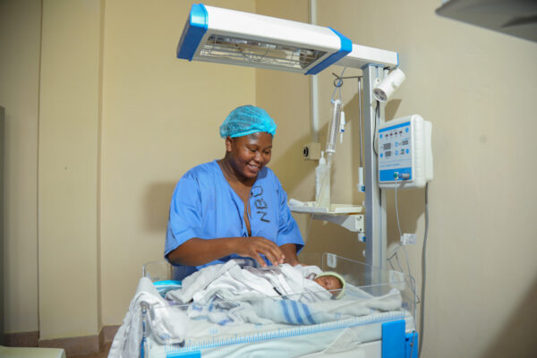 Joyce Kaingu, with her new born son during the opening of the Kilifi County Hospital fully equipped New Born Unit that was funded by Safaricom Foundation and Kilifi County government at a cost of KES 54 million.