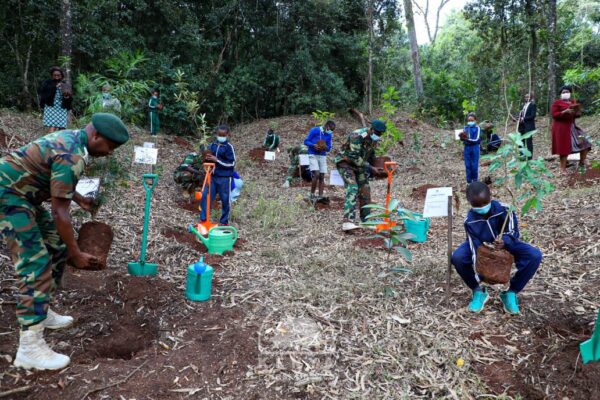 Pupils from Karura Forest Primary were yesterday elated to join the Chief Conservator of Forests Mr Julius Kamau in planting trees at Karura forest to number his age. 20/10/2021. PHOTO KFS.