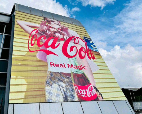 Coca-Cola HBC and Coca-Cola Beverages Africa logos with African map backdrop