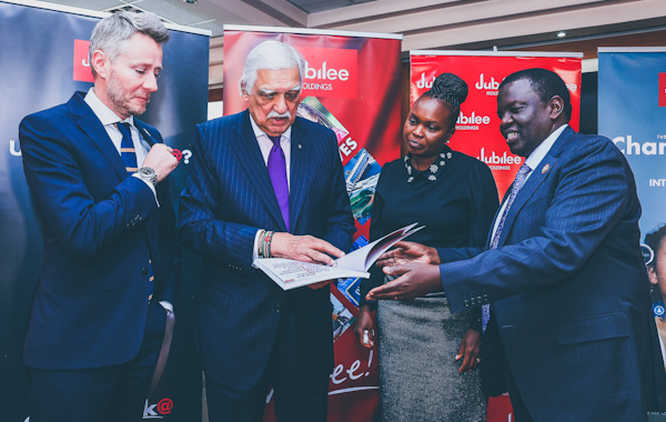 Juan Cazcarra, Group Chief Operating Officer; Nizar Juma, Group Chairman, Jubilee Holdings Limited; Margaret Kipchumba, Group Company Secretary and Head of Legal Services and Dr. Julius Kipngetich, Group Chief Executive Officer review the 2021 Annual Report during the virtual 2021 Annual General Meeting. 