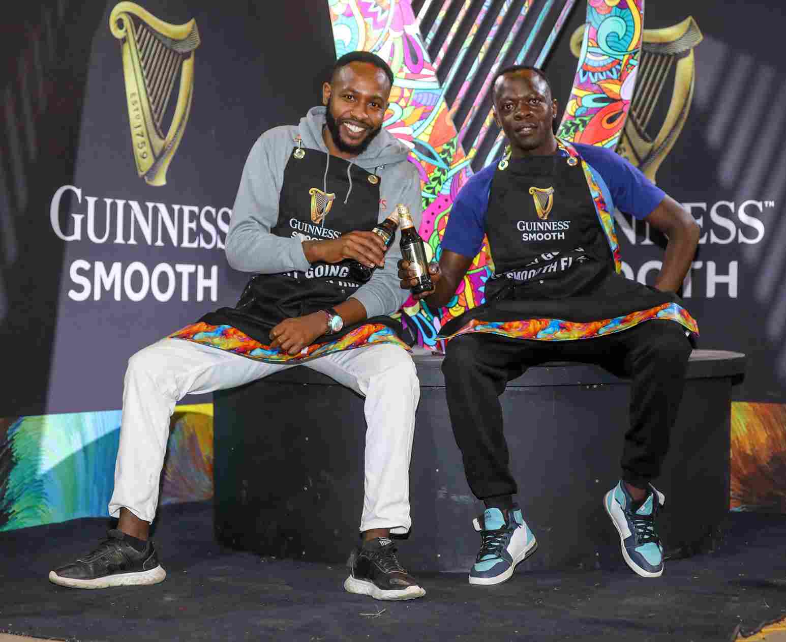 Barbers Sospeter Ngungi (Left) and Wycliff Mayaka pose for a photo during the Guinness Smooth “Easy Going, Smooth Flowing” campaign launch at TRM.