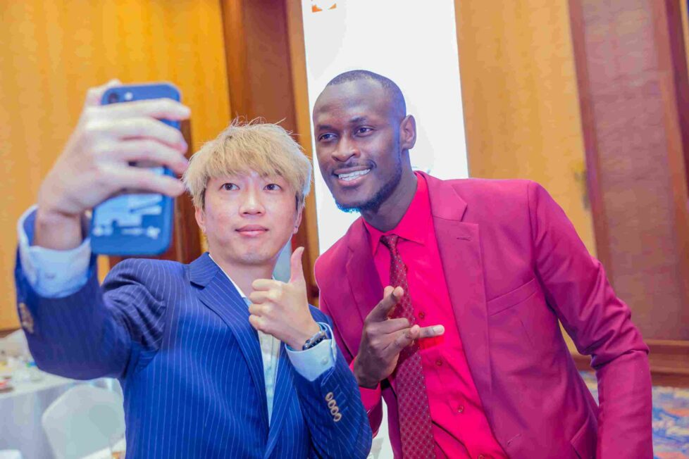 Ray Fang, Country Manager Transsion Kenya and Kennedy Ombima, better known by his stage names King Kaka during the launch of the itel S18 smartphone at Serena Hotel, Nairobi.