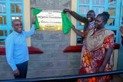 Safaricom PLC CEO Peter Ndegwa (L), and founders of Jawabu Rehabilitation Centre Patrick Korir (C), and his wife Rachael Korir (R), unveil a Physiotherapy Room funded by M-PESA Foundation.