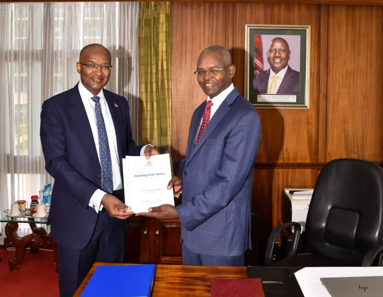 The new Central Bank of Kenya governor Kamau Thugge (right) and the outgoing governor Patrick Njoroge during the handover ceremony on June 19.