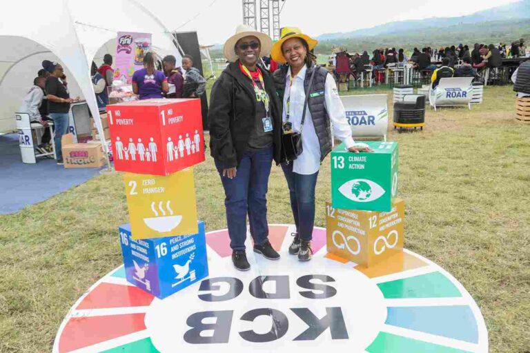 KCB Champions Sustainable Development Goals at the 2023 WRC held in Naivasha. From Judith Sidi Odhiambo, KCB Head of Corporate and Regulatory Affairs and Rosalind Gichuru, the KCB Group Director Marketing and Communications, showcase Sustainable Development Goal (SDG) Boxes at Soysambu tent, inspiring goal-oriented actions at the rally.