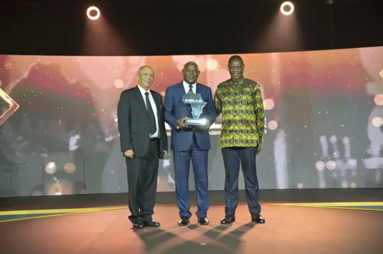 Equity Group Holdings CEO & MD Dr. James Mwangi (center) proudly displays his Lifetime Achievement Award at the All-Africa Business Leaders Award in Sun City, South Africa. Joining him in the photo are South Africa Deputy President Paul Meshatile (right) and Dr. Rakesh Wahi (left), Co-Founder and Chairman of Africa Business News Group.