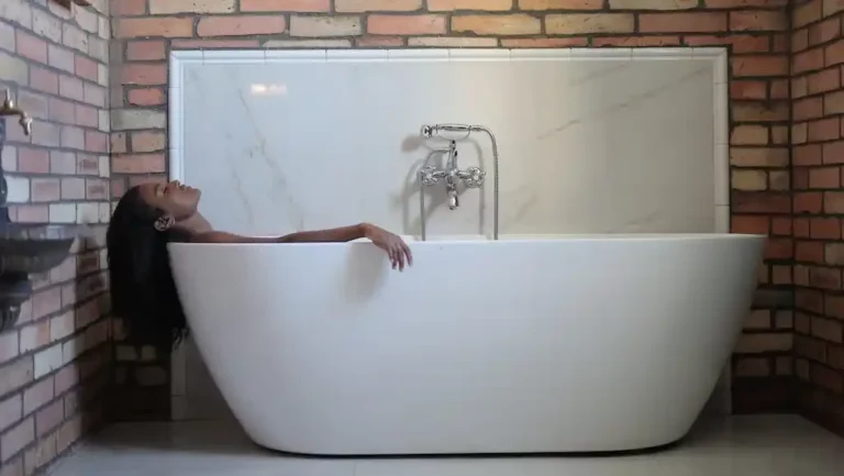 Person In A Bathtub, bathing is one way of detoxifying and keeping your vagina clean.