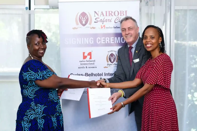 Mukawa (Hotels) Holdings Ltd Directors Ms Clare Njeri Githunguri (left) and Ms Lilian Joy Nyagaki Githunguri (right) exchange the hotel management agreements with Swiss-Belhotel International’s Senior Vice President Laurent Voivenel (centre) at the signing of a deal for the management of Nairobi Safari Club by the international hospitality group.