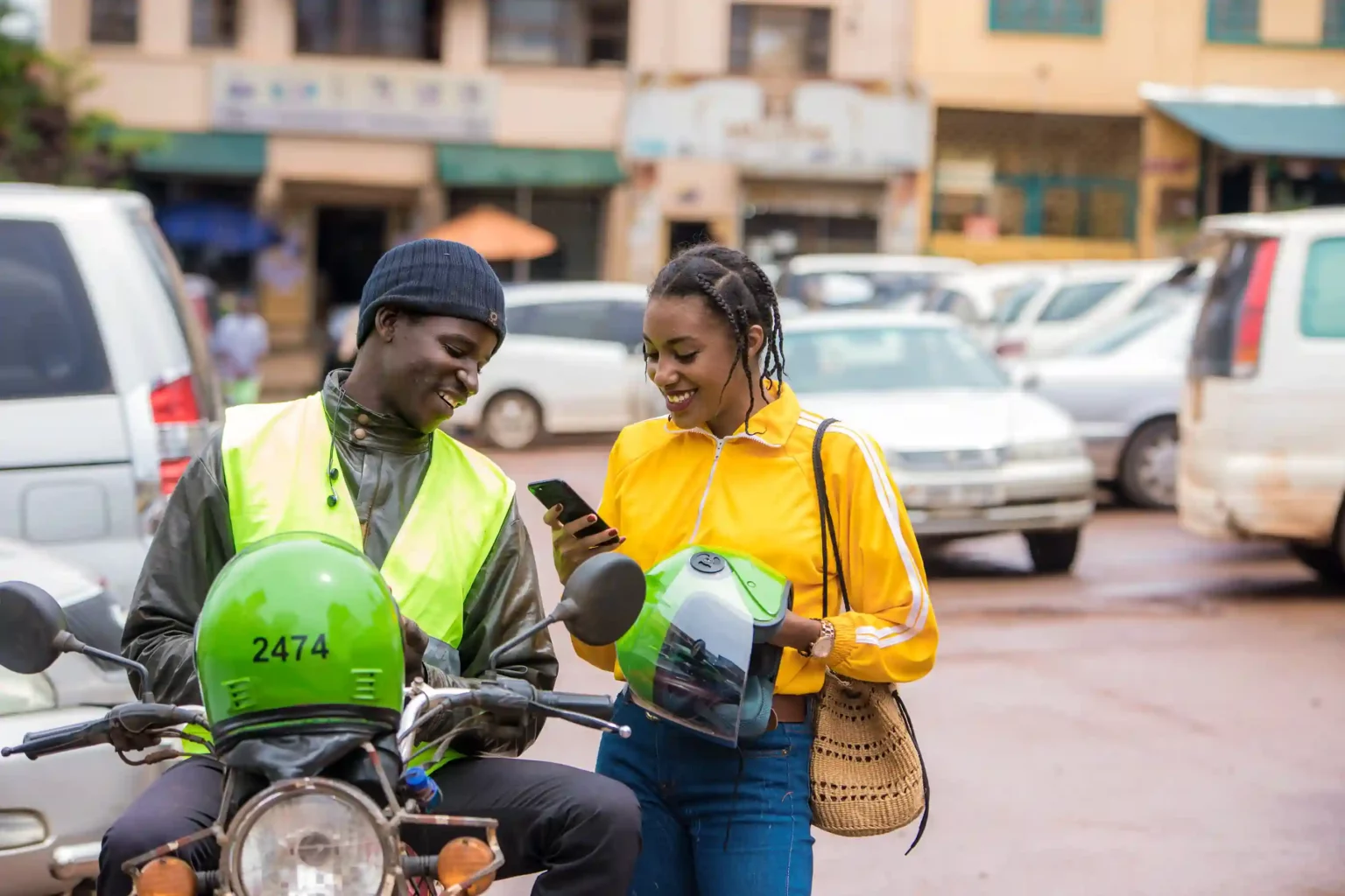 Bolt motorcycle driver and rider along a road. Rider verification is the latest addition to Bolt’s existing driver safety features, such as 24/7 safety support