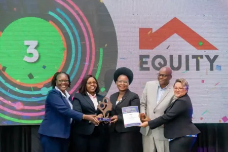 Equity Bank Kenya Associate Director Women & Youth Banking, Dr. Silpah Owich (centre), Equity Bank Kenya Director Retail & Branch Business, Carol Rutto (2nd left), Equity Kilimani Supreme Business Growth and Development Manager, Katherine Silva (right), and Equity Senior Relationship Manager, Commercial -Trade & Investments, Irene Irungu (left) receive an award for the most loved banking brand by women in Kenya, according to a recent survey conducted by IPSOS and BSD Group.