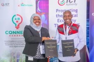 (L-R) Chief Consumer Business Officer, Safaricom PLC, Fawzia Ali Kimanthi and Chief Executive Officer, ICT Authority, Stanley Kamanguya exchage the signed cooperation agreement on the establishment and operation of Connect Academy between ICT Authority and Safaricom PLC during the ongoing Connected Africa Summit at Uhuru Gardens.