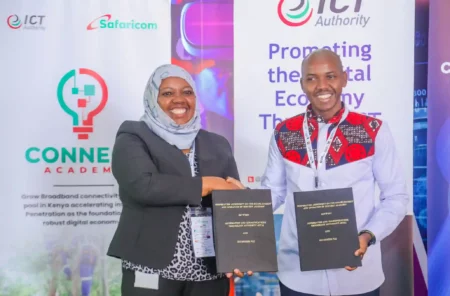 (L-R) Chief Consumer Business Officer, Safaricom PLC, Fawzia Ali Kimanthi and Chief Executive Officer, ICT Authority, Stanley Kamanguya exchage the signed cooperation agreement on the establishment and operation of Connect Academy between ICT Authority and Safaricom PLC during the ongoing Connected Africa Summit at Uhuru Gardens.