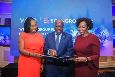 From left to right: WPP Scangroup PLC Chief Executive Officer Patricia Ithau, WPP Scangroup Board Chair Richard Omwela and WPP Scangroup Chief Financial Officer Miriam Kaggwa peruse through the 2023 Financial Results report during WPP Scangroup’s investor briefing event.