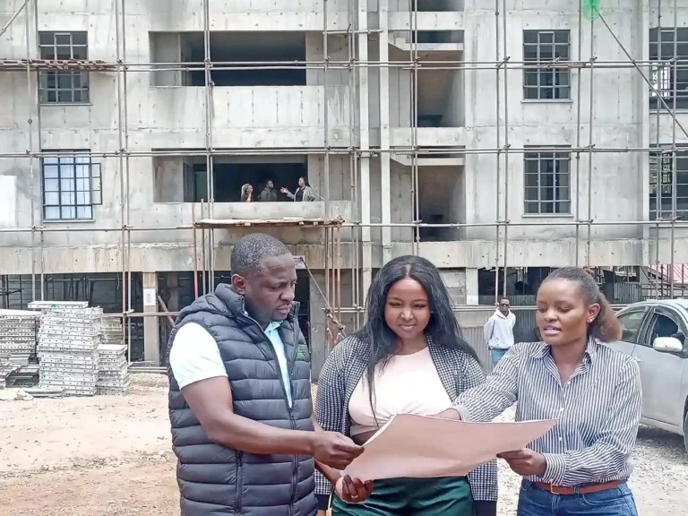 SIC Investment Co-operative CEO Churchill Winstones, a SIC investor and Daniella Nyakuraya, Housing Unit Manager, SIC at thr tour of The Miran Residence, a KSH 750 M residential development.