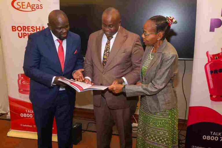 Joel Kamau, Daniel Kiptoo Bargoria, and Wanjiku Manyara at Proto Energy Sustainability Report launch