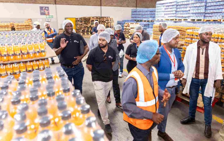 AQ Hamza and delegates tour Hyper Psaro bottling plant in Lubumbashi