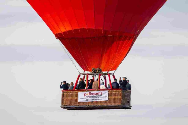 Pollman’s Tours safari vehicle in Kenya’s Maasai Mara landscape