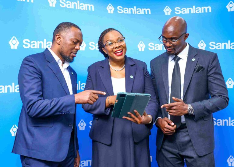 Sanlam Life executives Isaac Mwangi, Jacqueline Karasha, and Jack Marwa share a light moment during the launch of the Akiba Plus pension solution.