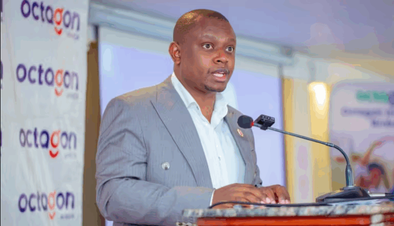 David Ongiro, CEO of Octagon Africa Kenya, standing confidently in professional attire, representing leadership in financial inclusion and retirement innovation.