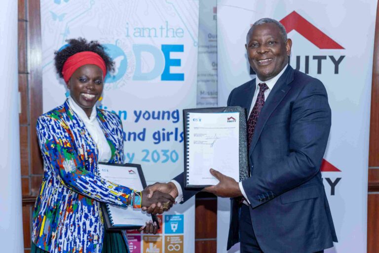 Lady Mariéme Jamme and Dr. James Mwangi stand side by side during the signing of the iamtheCODE and Equity Group Foundation partnership.