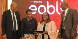 EABL CFO Risper Ohaga with Chair Martin Oduor and MD Jane Karuku at media briefing