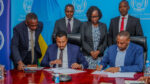 Principal Secretary Mohamed Daghar and Permanent Secretary Canoth Manishimwe sign logistics MoU in Kigali.