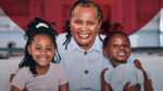 A mother relieved as Jubilee Health Insurance covers her child’s hospital bills through an affordable installment plan.