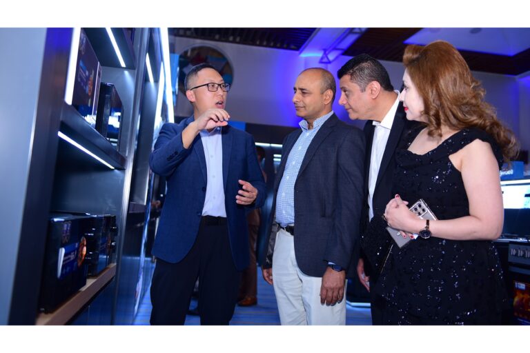 Bright Yao of Midea Africa speaks with Rakesh Singh of Opalnet, Mehboob Manji and Katty Manji of Alyasrin Appliances at the Midea Dealers Conference in Nairobi.
