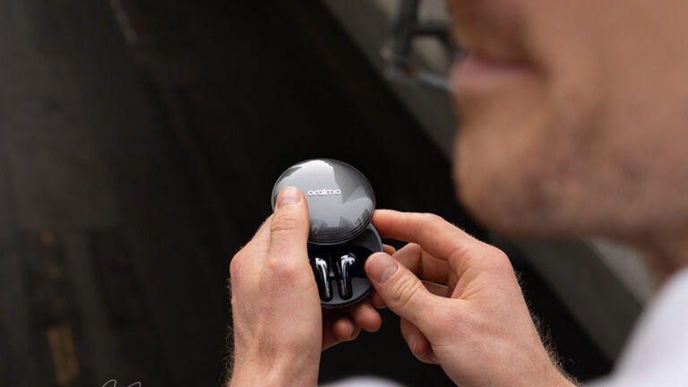 Oraimo SpaceBuds 2 OTW-631 wireless earbuds and charging case in Lunar Eclipse design