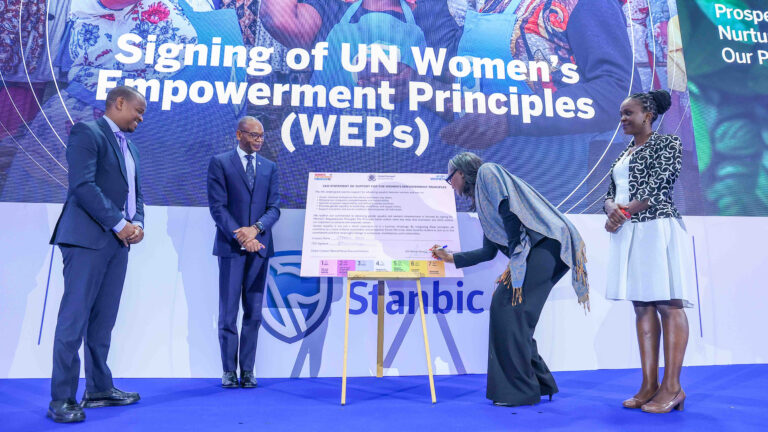 Stanbic Holdings Plc: Building a Sustainable Financial Future in Kenya Ms. Antonia N'gabala Sodonon, UN Women Country Representative to Kenya, signs the UN Women's Empowerment Principles at Stanbic Bank Kenya's 2025 Sustainability Report launch in Nairobi, alongside Standard Bank Regional Chief Executive East Africa Dr. Joshua Oigara, the Acting Chief Executive of Stanbic Bank Kenya and South Sudan, and Global Compact Network Kenya's Mary Waweru.