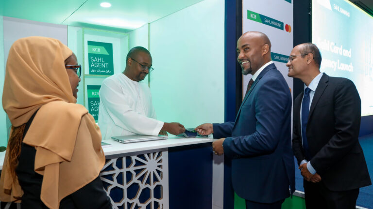 Shariah advisor and KCB director test Sahl card at agent point