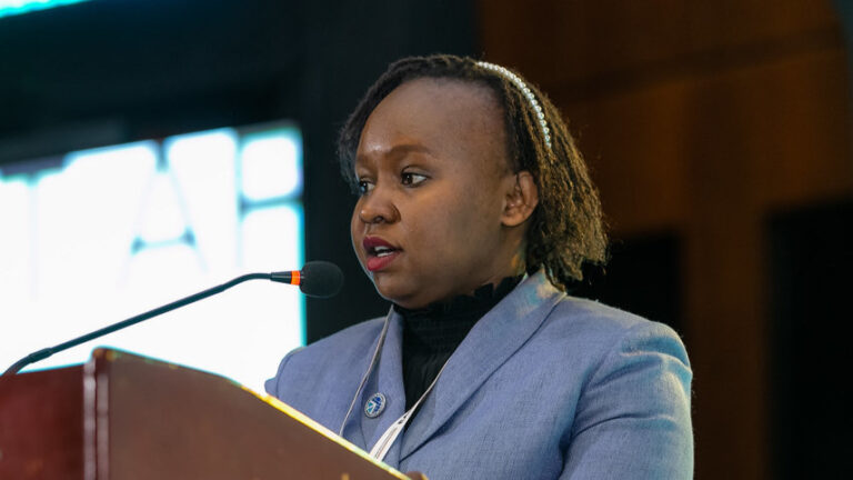 Rosemary Koech Kimwatu, Head of Data Protection at KCB Bank Group, speaking at a conference podium