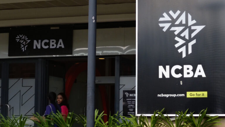 CBK Approves Nedbank’s Acquisition Of NCBA Stake NCBA Bank branch entrance with banking hours signage in Kigali