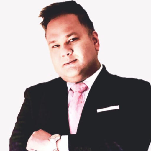 Navin Mahadeo, former Head of Cards at Absa Bank, in a formal portrait