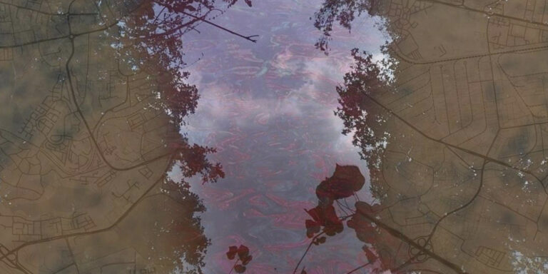 Nairobi Installation Explores Water, Colonial History And African Knowledge Artistic composite image showing a river reflection layered over a street map, with dark red foliage framing the water in the centre.