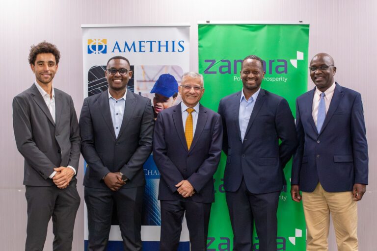 Amethis Buys Into Zamara to Fund Pan African Expansion Executives from Zamara Holdings and Amethis stand together at a partnership signing event, with Amethis and Zamara branded banners behind them.